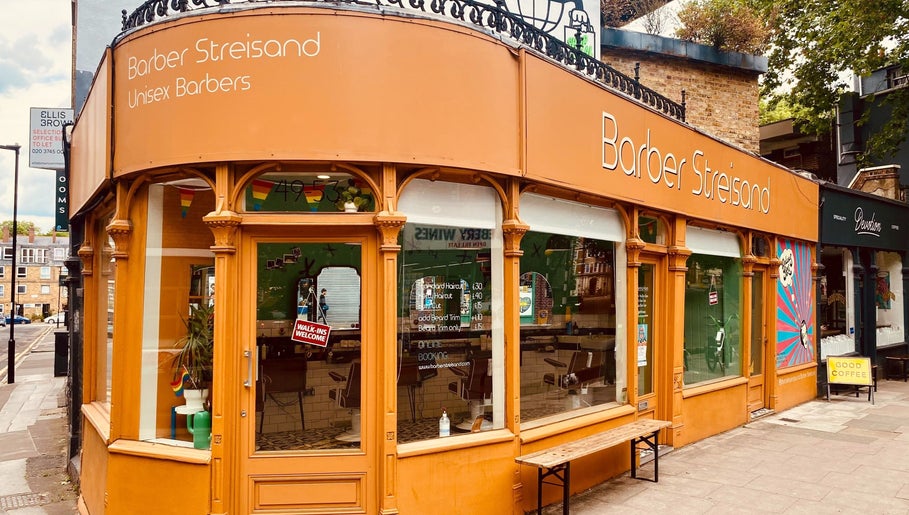 Stylish front of Barber Streisand in London, England, GB, showcasing its vibrant facade and inviting atmosphere.