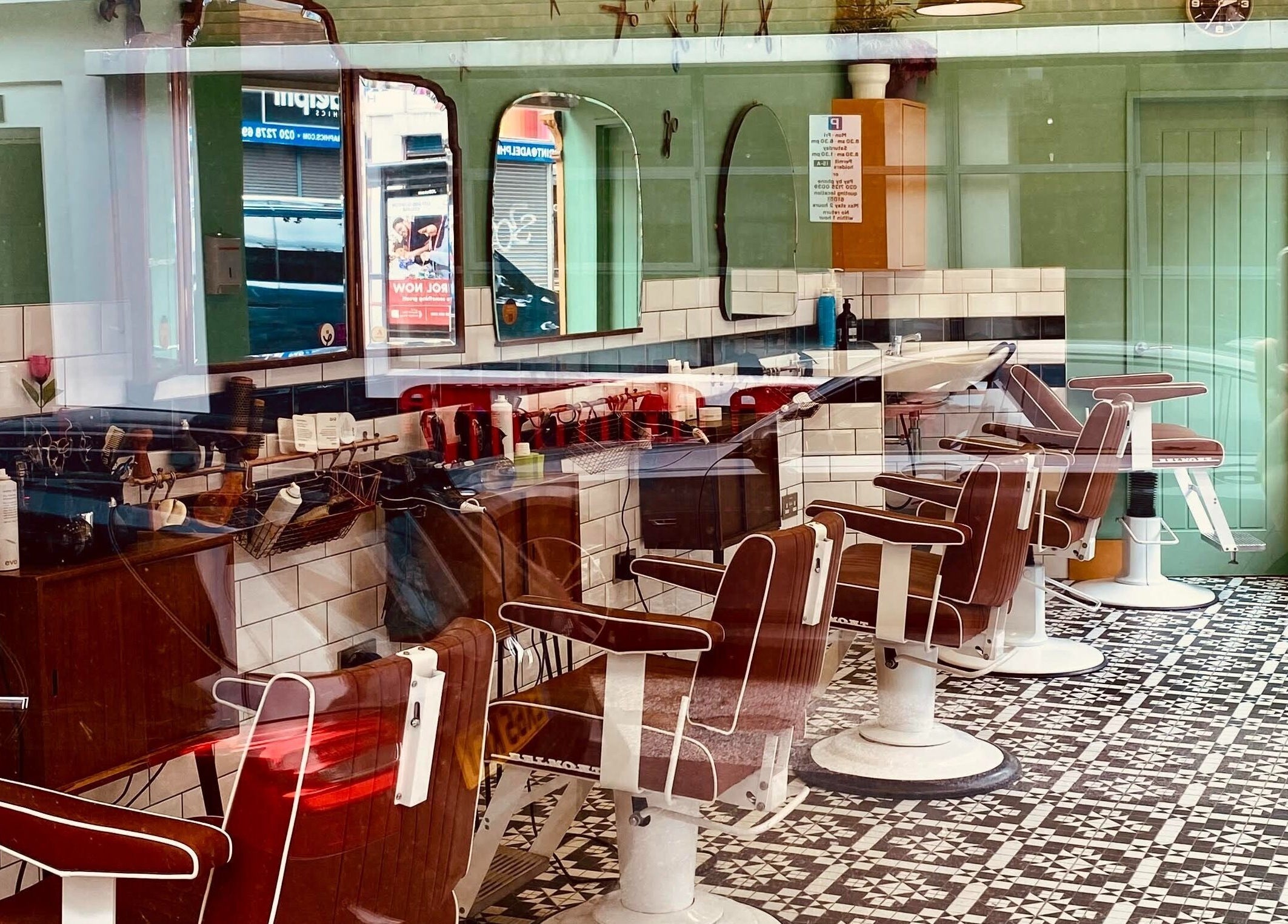 Interior view of Barber Streisand with vintage chairs, London, England, GB.