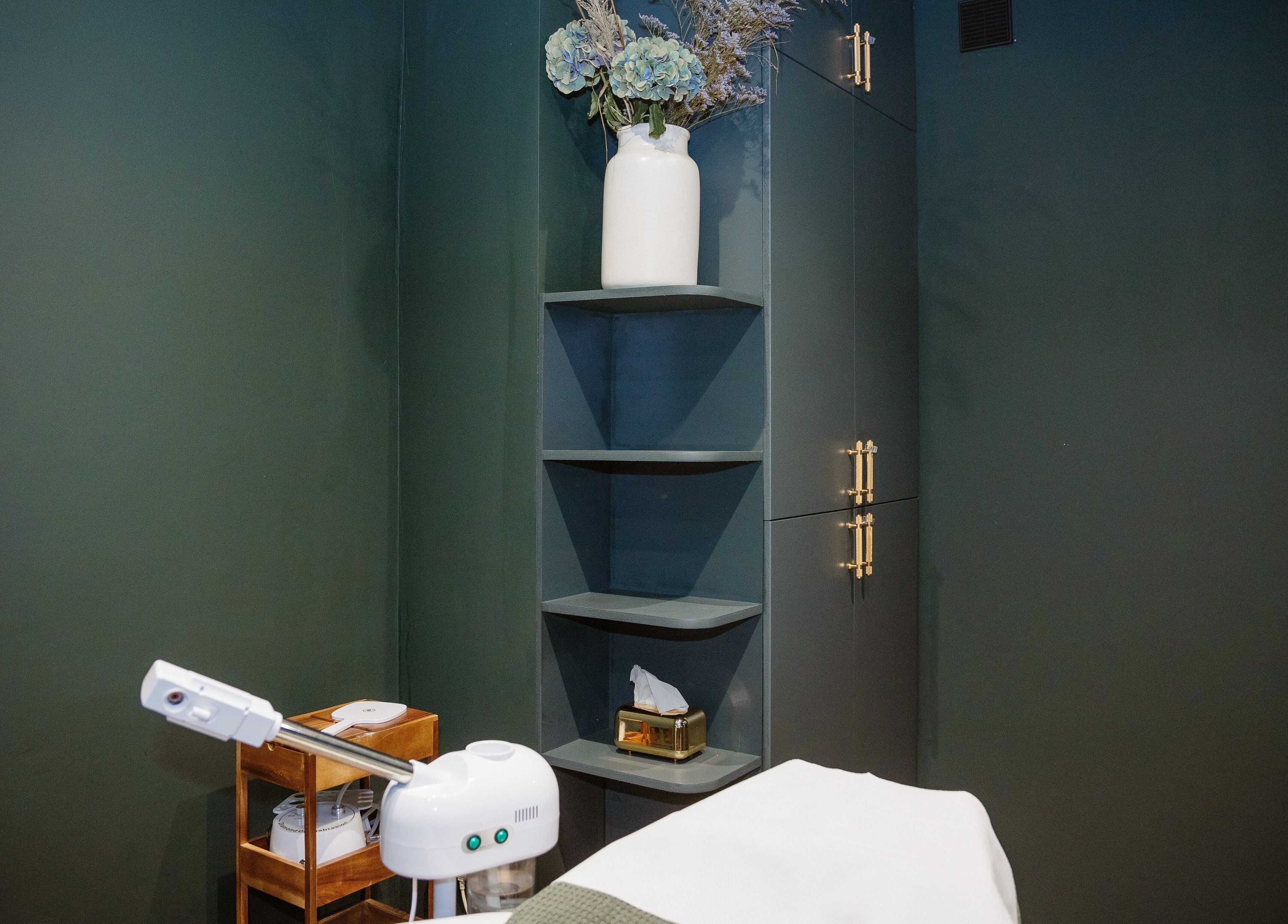 Tranquil treatment room at EGP Aesthetics, London, England, GB, featuring elegant decor and wellness equipment.