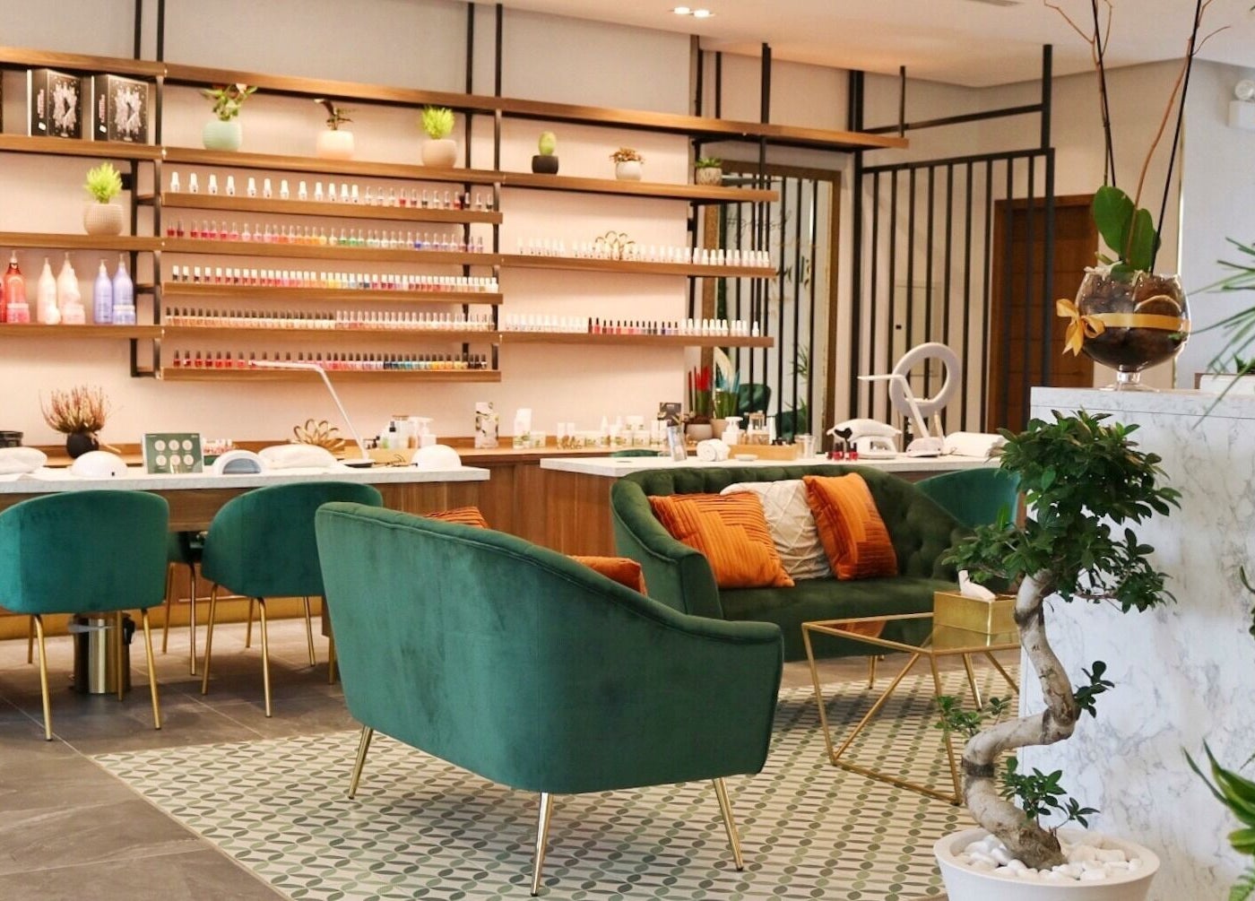 Gloss'd Beauty Lounge | Khobar interior features chic green seating and elegant decor, located in Al Khobar, Eastern Province, SA.