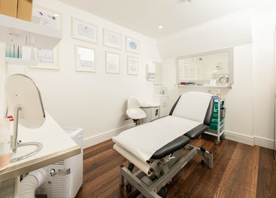 Elegant treatment room at Barbanente Clinic, London, England, GB featuring modern design and comfortable amenities.