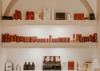 Product display at The Key 2 Skin, Richmond, New South Wales, AU showcasing skincare items on elegant shelves.