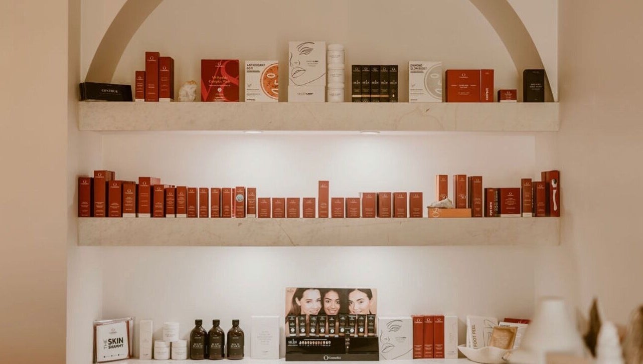 Beauty products at The Key 2 Skin, Richmond, New South Wales, AU, elegantly displayed on stylish shelves.