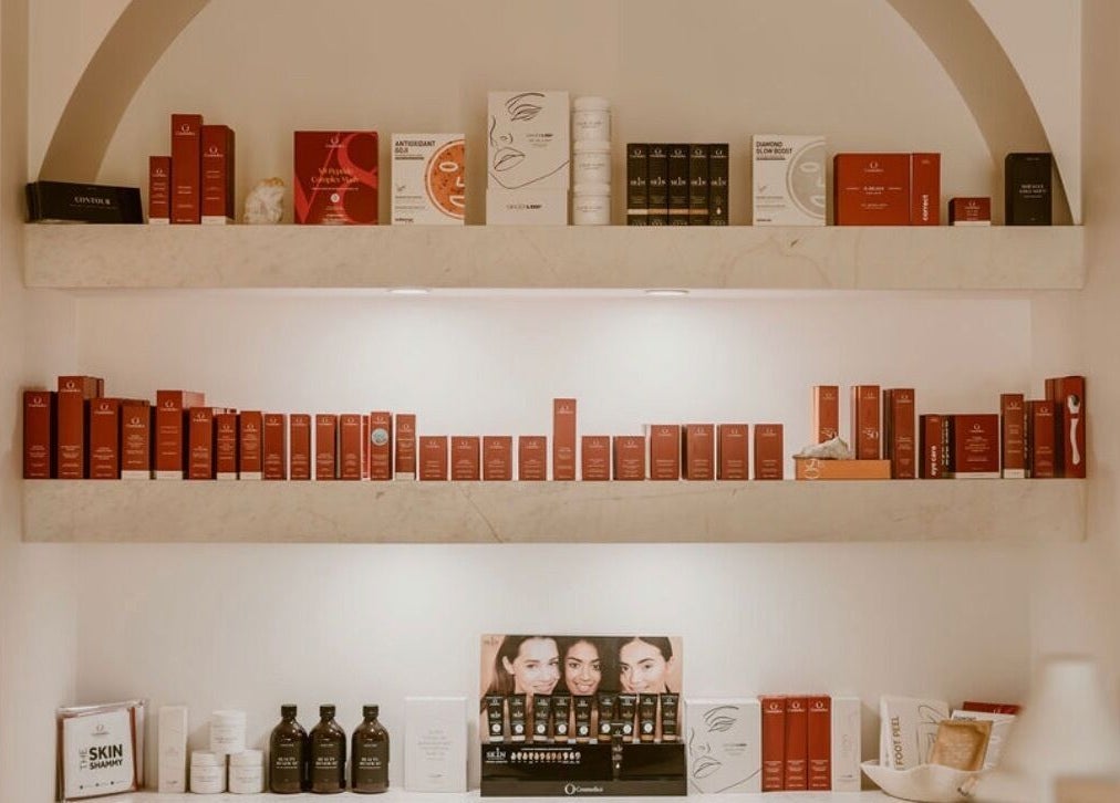 Beauty products at The Key 2 Skin, Richmond, New South Wales, AU, elegantly displayed on stylish shelves.