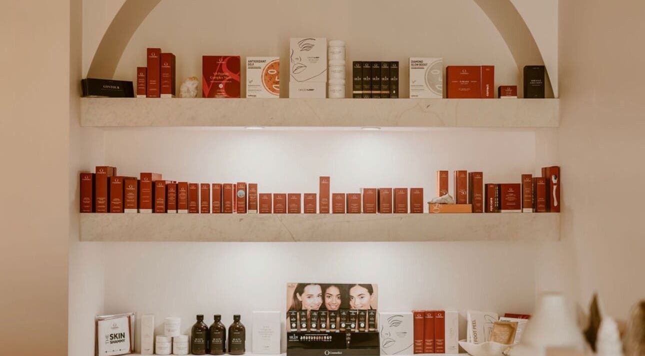 Beauty products at The Key 2 Skin, Richmond, New South Wales, AU, elegantly displayed on stylish shelves.