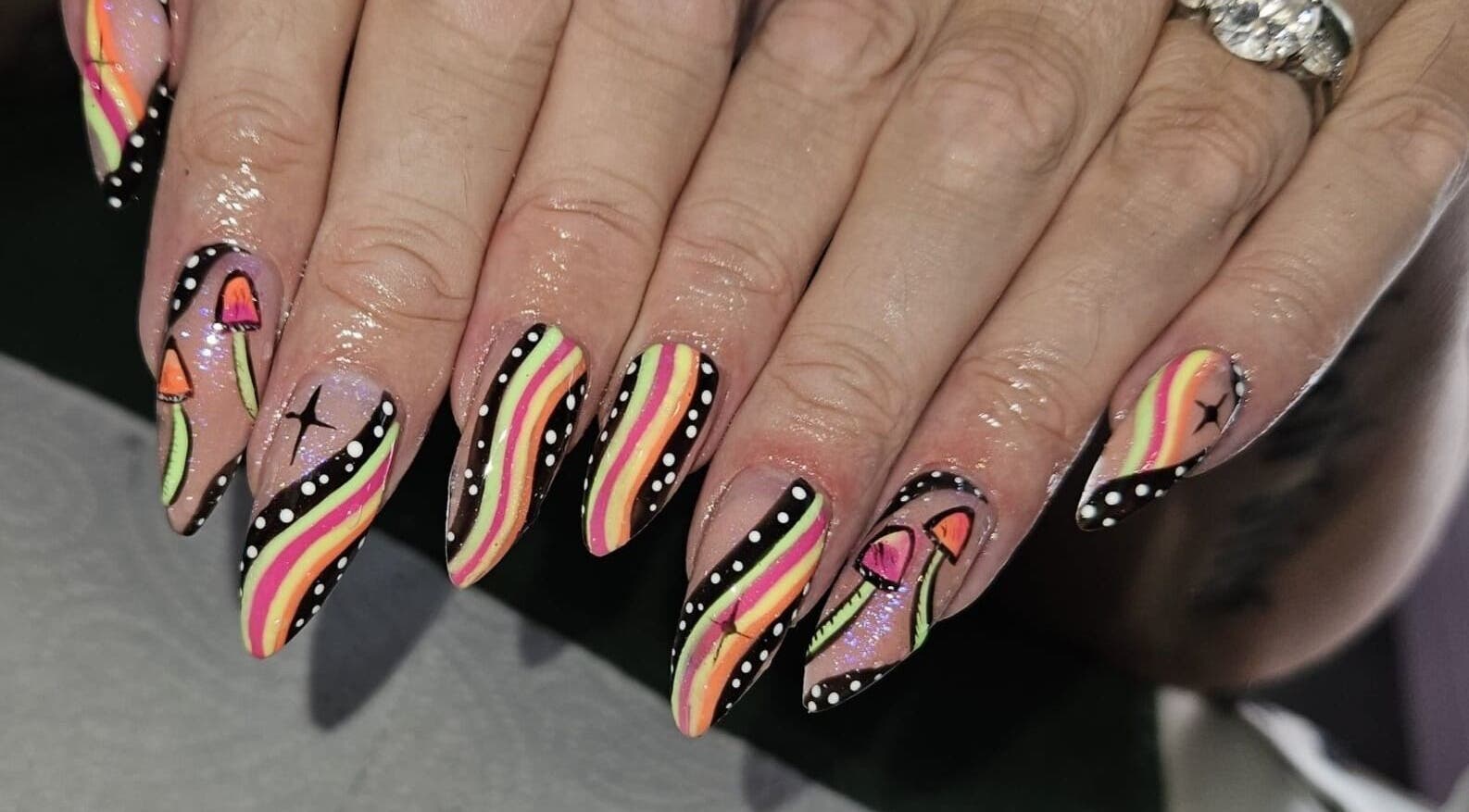 Vibrant neon nail art at SVJ Beauty, Whitehaven, England, GB offers a stunning and creative manicure style.