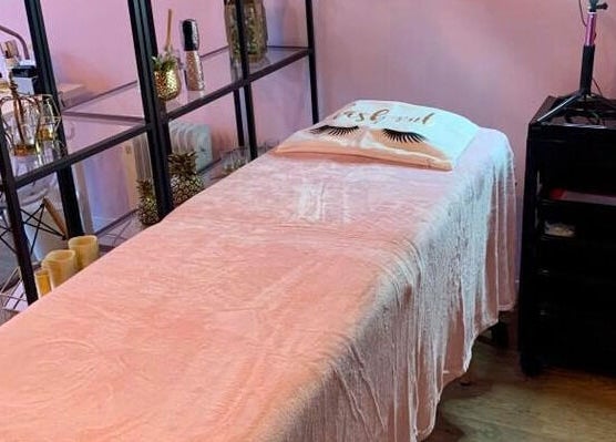 Hello Beautiful spa room with plush treatment bed in Lytham, England, GB, offering a relaxing ambiance.