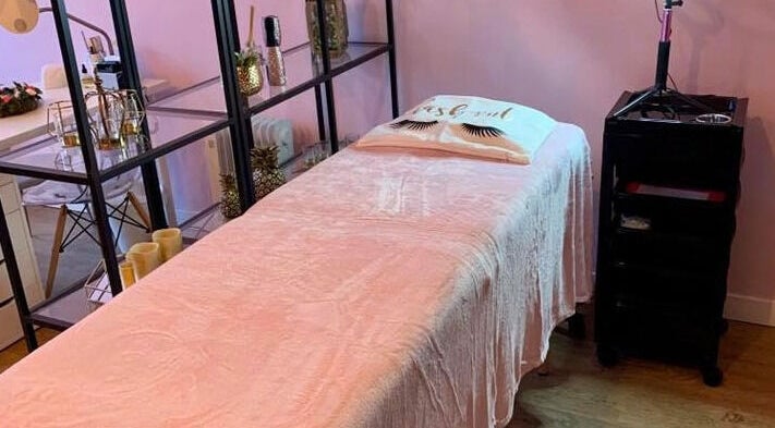 Hello Beautiful spa room with plush treatment bed in Lytham, England, GB, offering a relaxing ambiance.