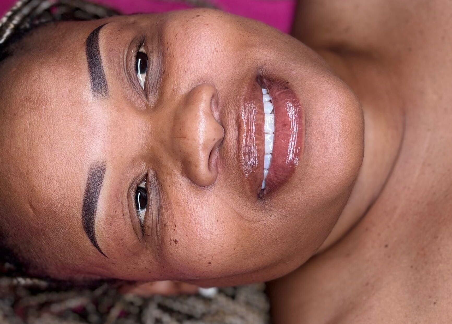 Smiling woman with glowing skin at Make Up Artistry by Sgo Melax, Kuruman, Northern Cape, ZA.