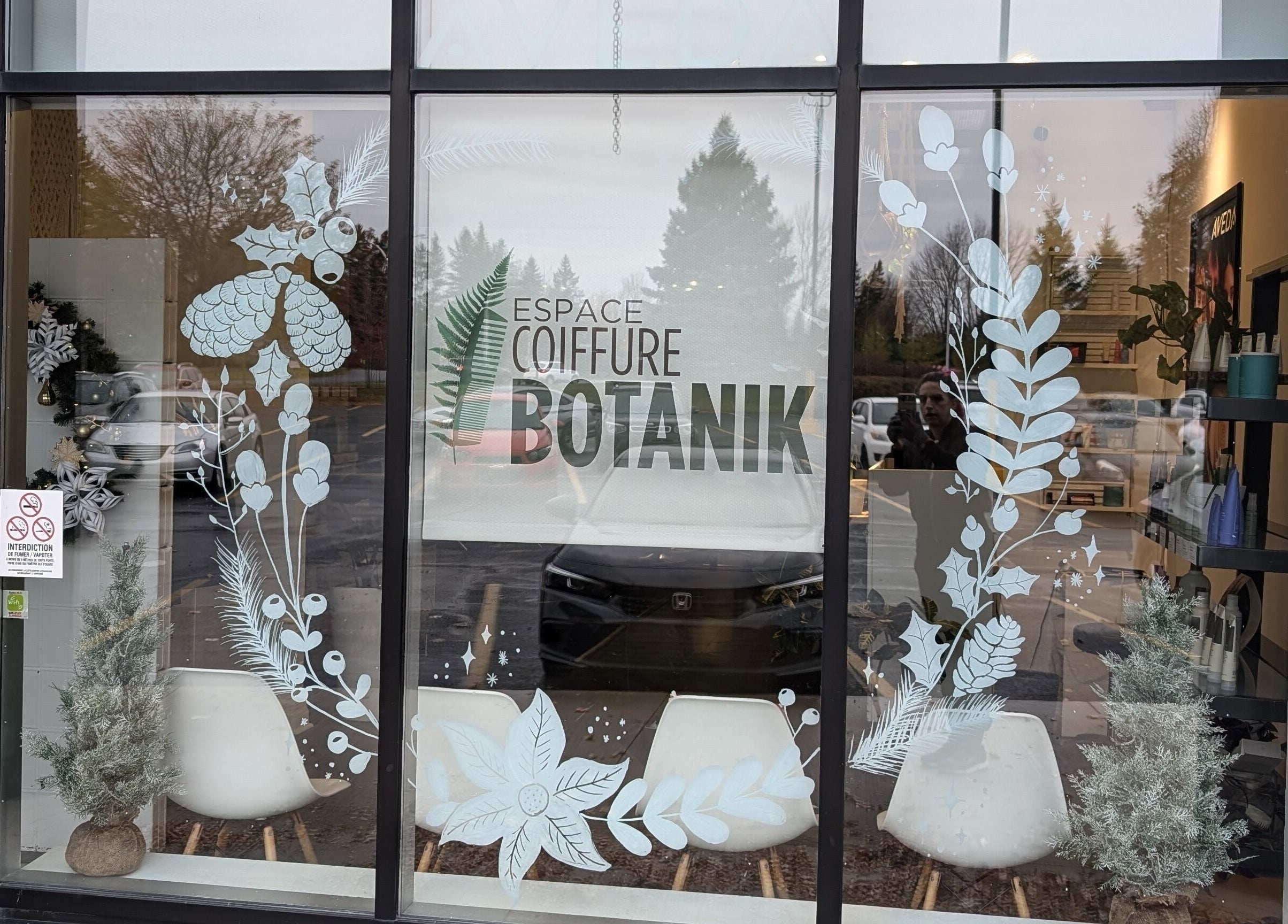 Espace Coiffure Botanik facade in Saint-Bruno-de-Montarville, Québec, CA with botanical window decor.