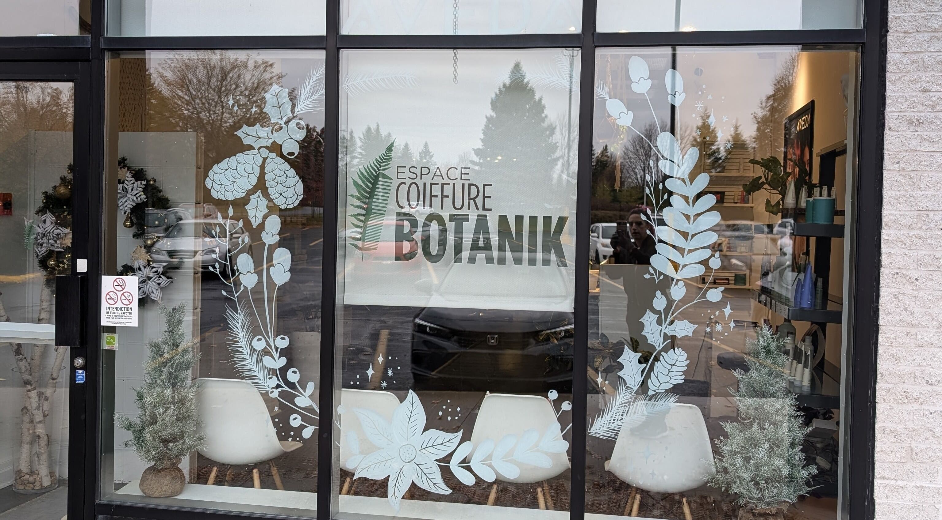 Espace Coiffure Botanik facade in Saint-Bruno-de-Montarville, Québec, CA with botanical window decor.