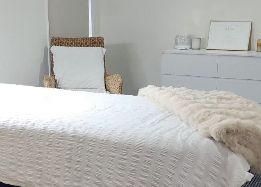 Relaxing treatment room at Face Edit - Beauty Edition, Auckland, Auckland, NZ with cozy bed and decor.