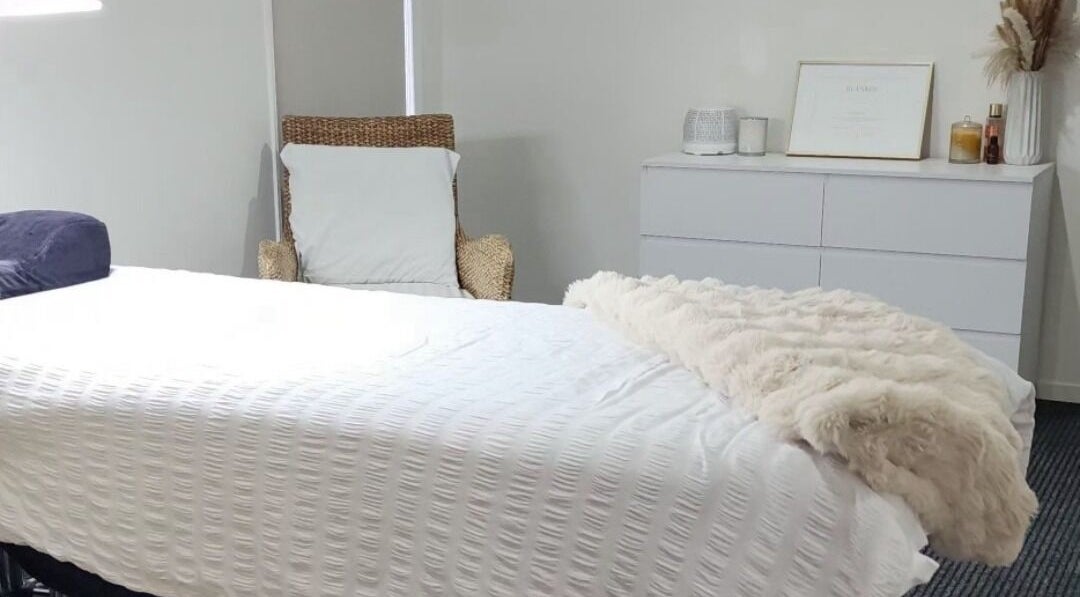 Relaxing treatment room at Face Edit - Beauty Edition, Auckland, Auckland, NZ with cozy bed and decor.