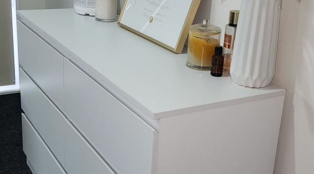 Chic dresser display at Face Edit - Beauty Edition, Auckland, NZ with decor and beauty products.