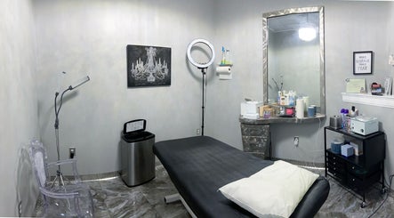 Modern treatment room at The Wax Pot - St Pete, featuring comfortable bed and amenities in St. Petersburg, Florida, US.
