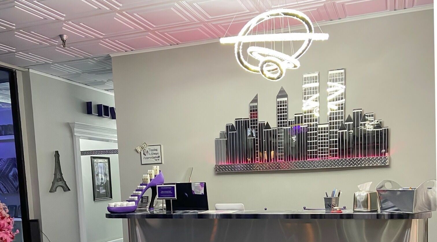 Modern reception at The Wax Pot - St Pete, St. Petersburg, Florida, US with stylish decor and elegant lighting.