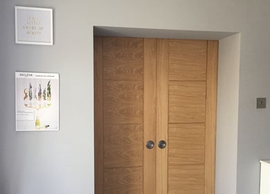LHB interior features a wooden door and elegant decor in London Colney, England, GB.
