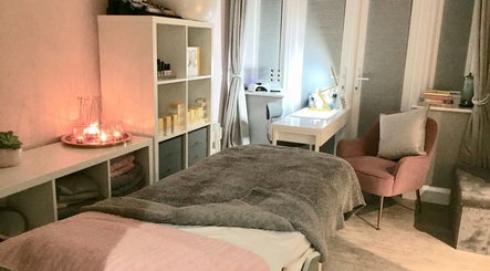Cozy treatment room at LHB in London Colney, England, GB with calming decor and soothing lighting.