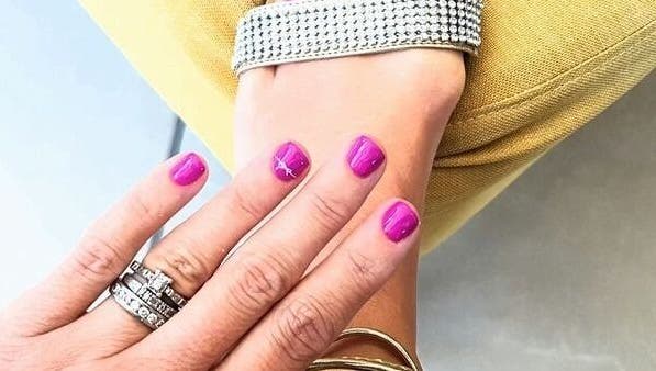 Elegant pink manicure at Halo Grooming Studio, Cape Town, Western Cape, ZA, showcasing stylish jewelry.