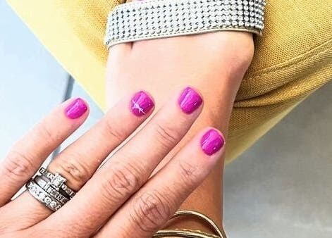 Elegant pink manicure at Halo Grooming Studio, Cape Town, Western Cape, ZA, showcasing stylish jewelry.