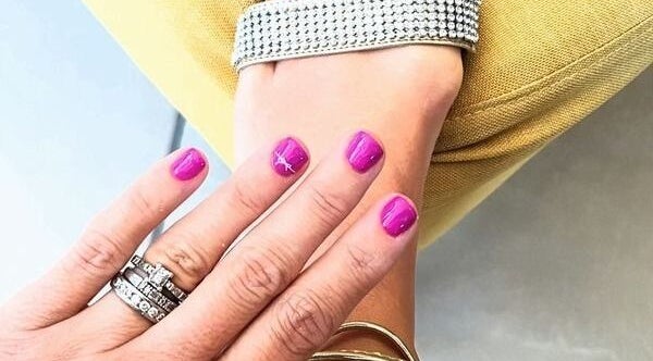 Elegant pink manicure at Halo Grooming Studio, Cape Town, Western Cape, ZA, showcasing stylish jewelry.