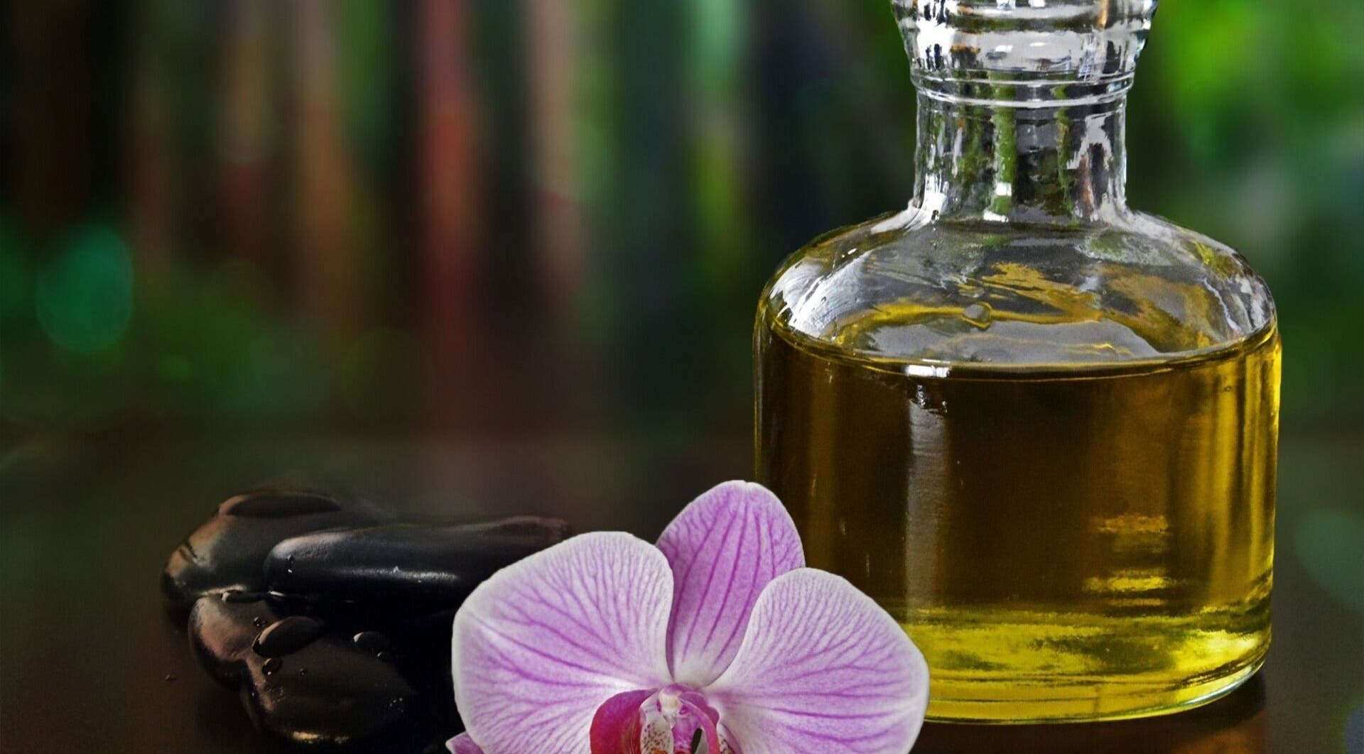 Aromatherapy oil and orchid at Halo Grooming Studio, Cape Town, Western Cape, ZA for ultimate relaxation.