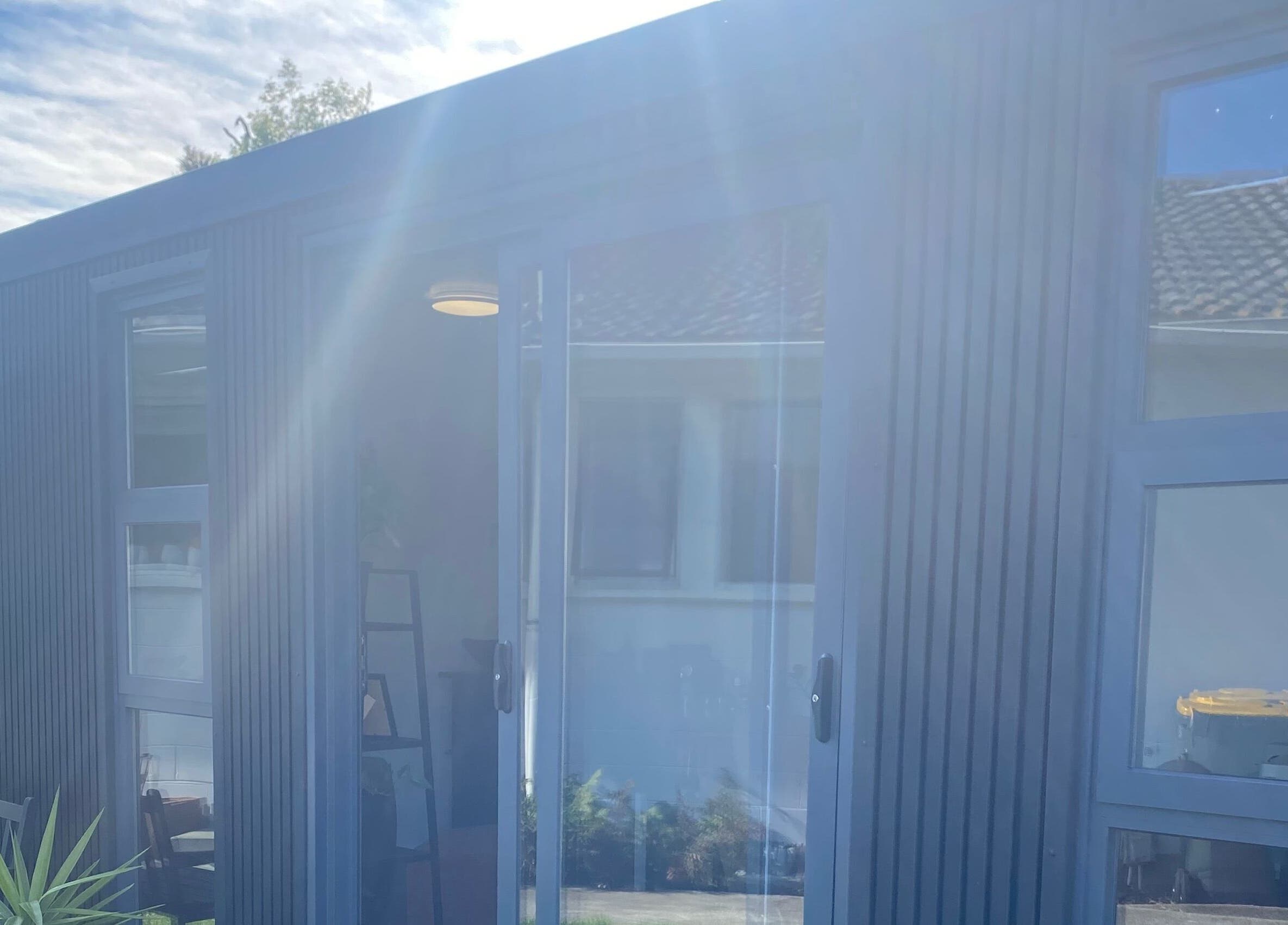 Exterior view of Colour Boutique in Christchurch, Canterbury Region, NZ, featuring modern design and natural light.