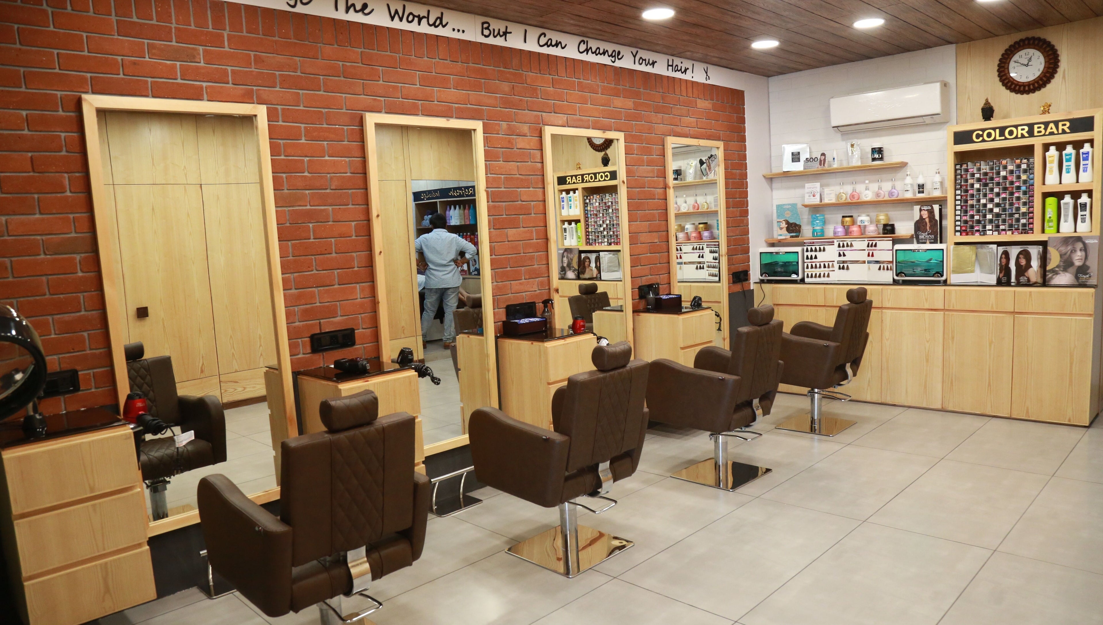 Modern interior of J and K Signature Unisex Salon in Anand, Gujarat, IN, featuring stylish salon chairs and mirrors.