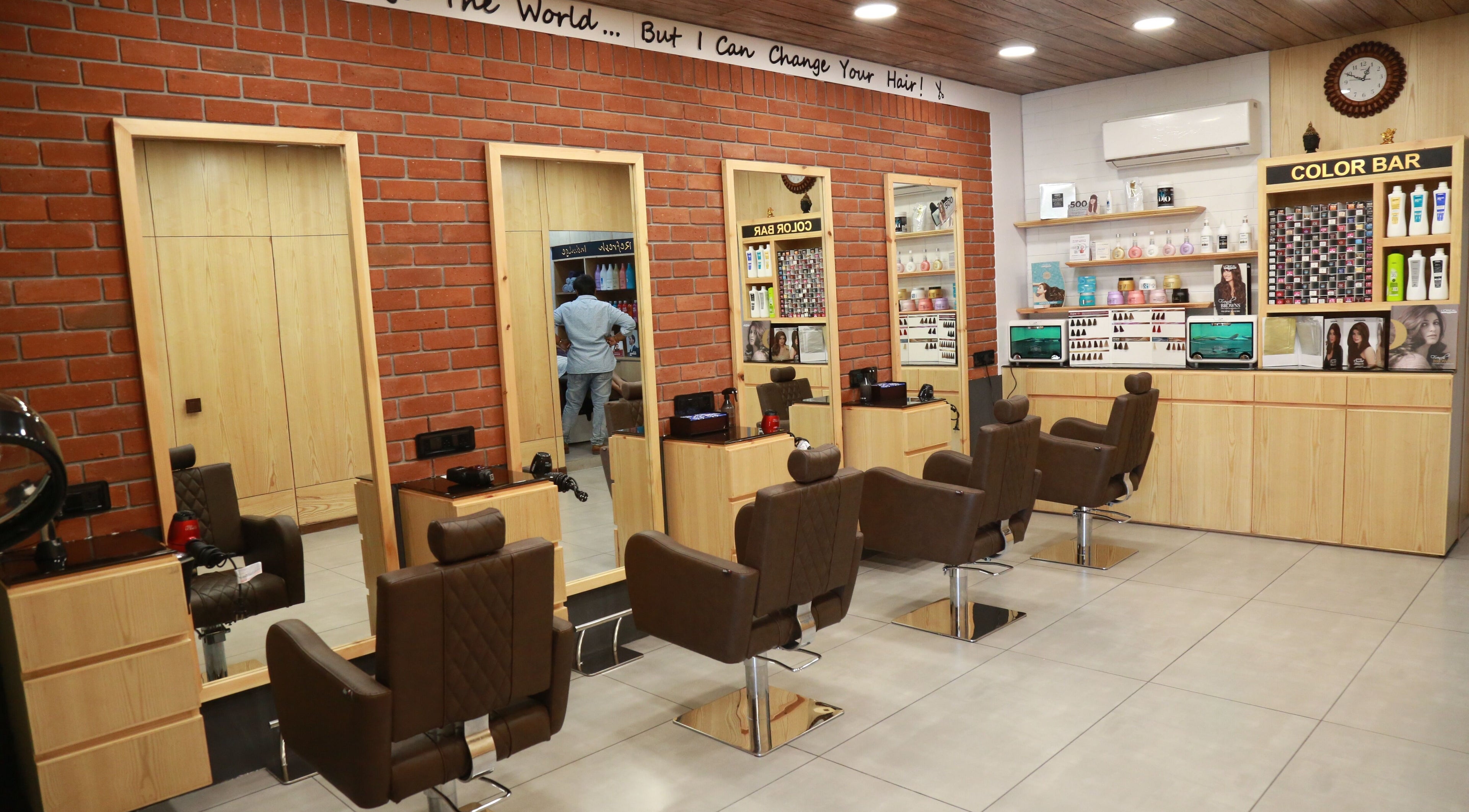 Modern interior of J and K Signature Unisex Salon in Anand, Gujarat, IN, featuring stylish salon chairs and mirrors.