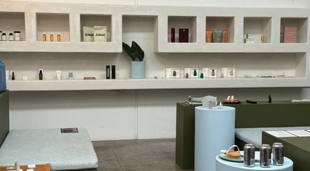 Nimbus Co - Byron Bay showcases elegant wellness products on minimalist shelves in Byron Bay, New South Wales, AU.