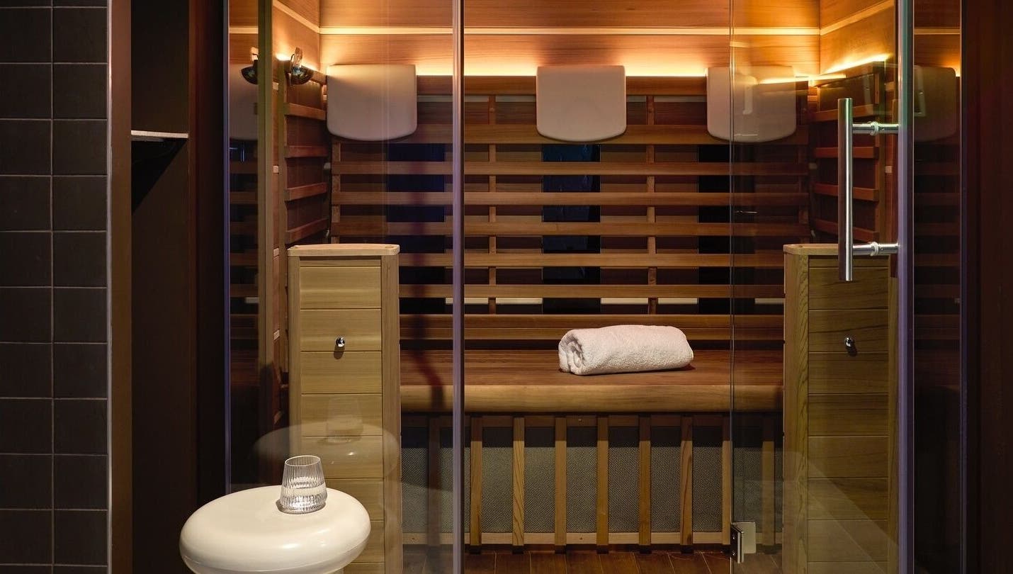 Elegant sauna room at Nimbus Co - Byron Bay, crafted with wood, located in Byron Bay, New South Wales, AU.