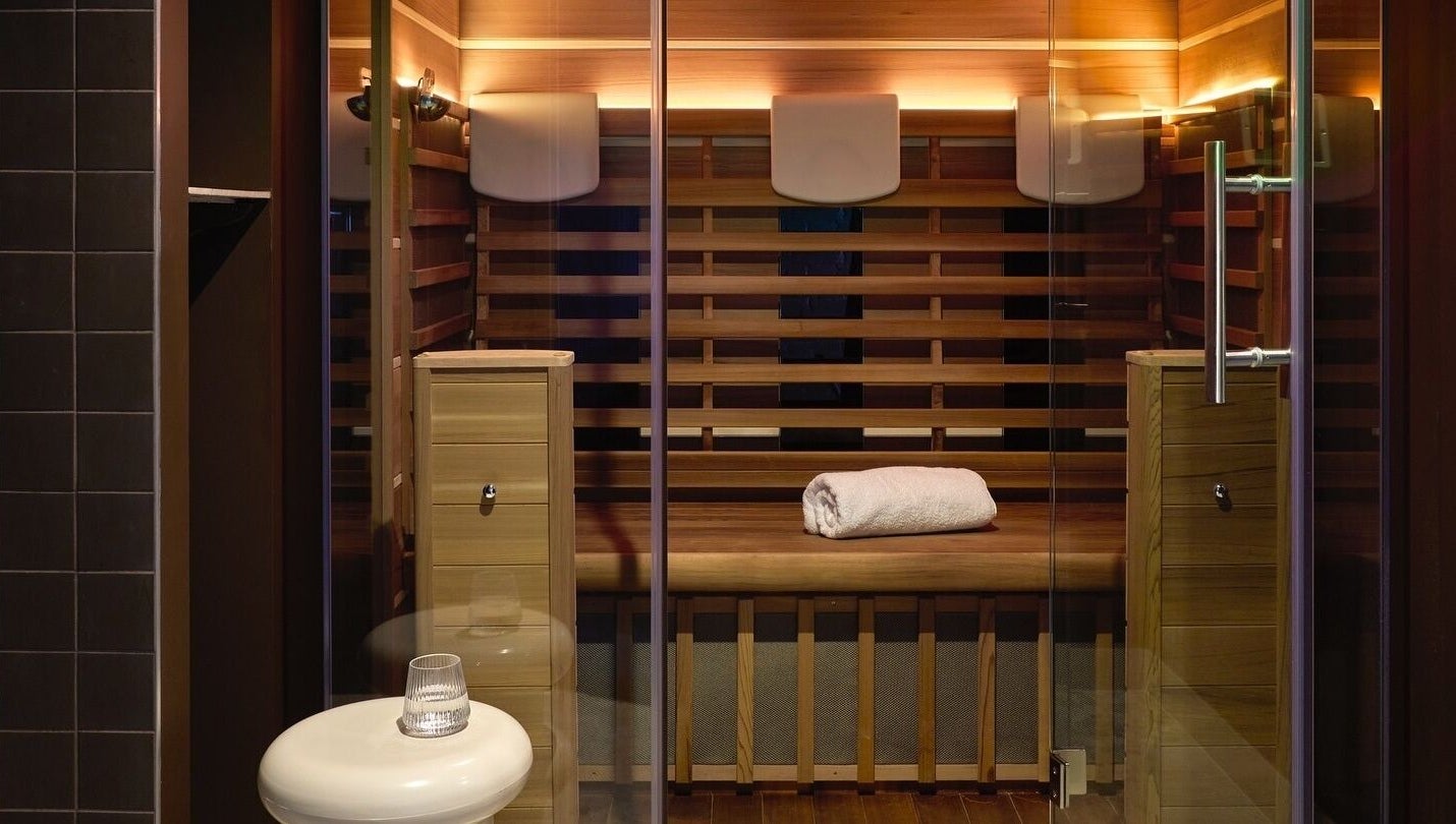 Elegant sauna room at Nimbus Co - Byron Bay, crafted with wood, located in Byron Bay, New South Wales, AU.
