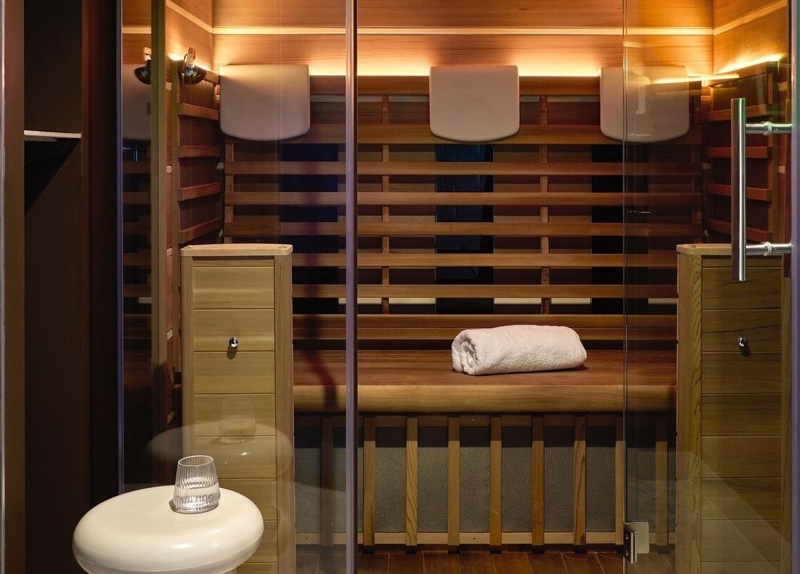 Elegant sauna room at Nimbus Co - Byron Bay, crafted with wood, located in Byron Bay, New South Wales, AU.