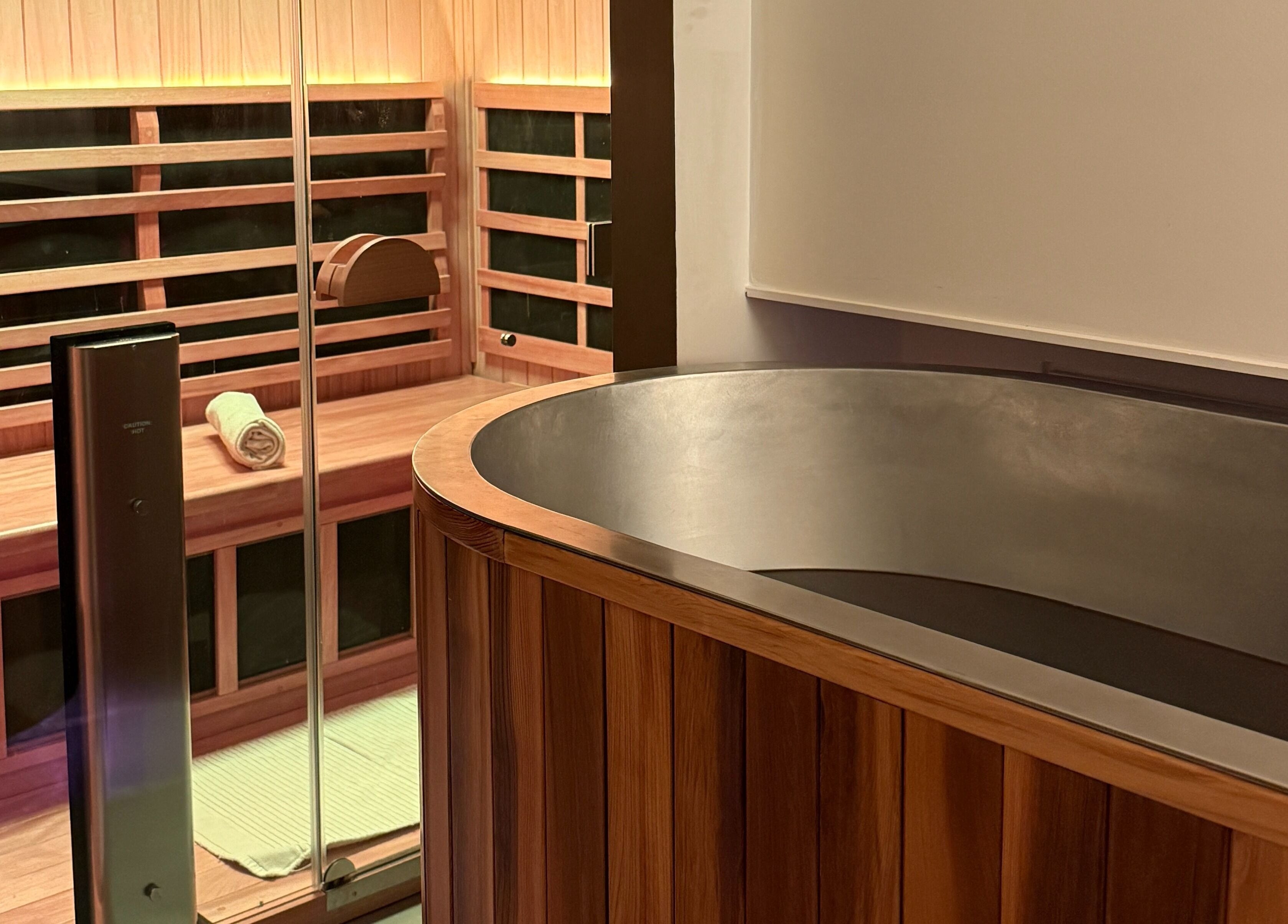 Luxurious sauna room at Nimbus Co - Byron Bay in Byron Bay, New South Wales, AU with inviting wooden interior.