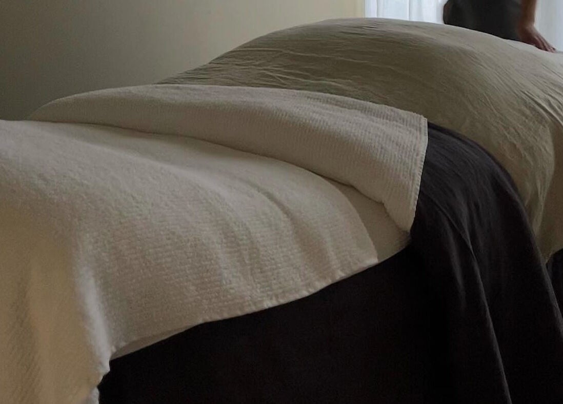 Luxurious massage table at Nimbus Co - Byron Bay, offering tranquility in Byron Bay, New South Wales, AU.