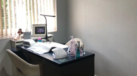 Taurus Beauty's elegant nail station in Sutton Coldfield, England, GB, showcasing tools and cozy ambiance.