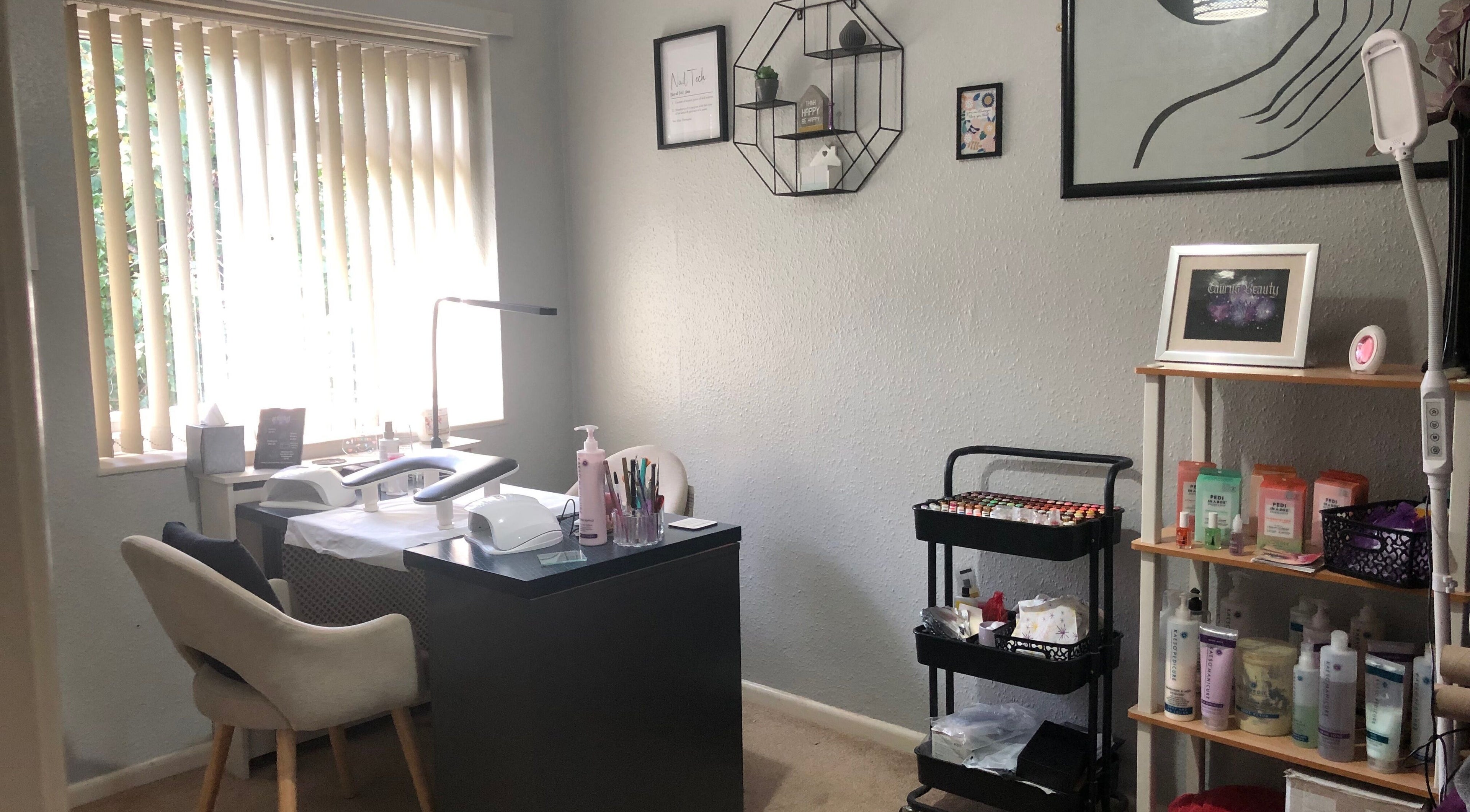 Cozy nail care station at Taurus Beauty in Sutton Coldfield, England, GB with modern decor and daylight view.