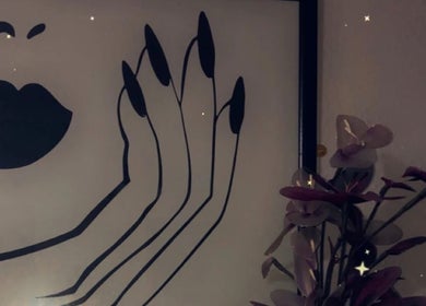 Stylish wall art and flowers at Taurus Beauty, Sutton Coldfield, England, GB.