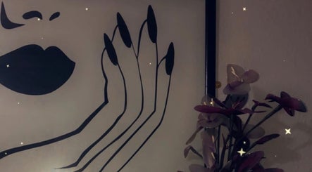 Stylish wall art and flowers at Taurus Beauty, Sutton Coldfield, England, GB.