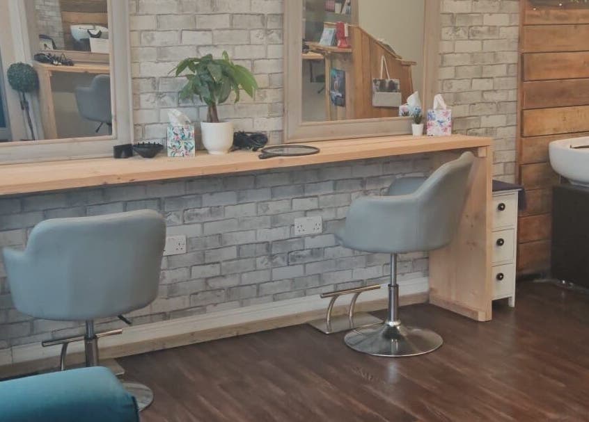Modern styling station with chairs at Sammy at Cabello, Goole, England, GB. Perfect ambiance for beauty services.
