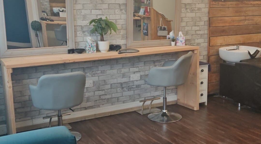 Modern styling station with chairs at Sammy at Cabello, Goole, England, GB. Perfect ambiance for beauty services.