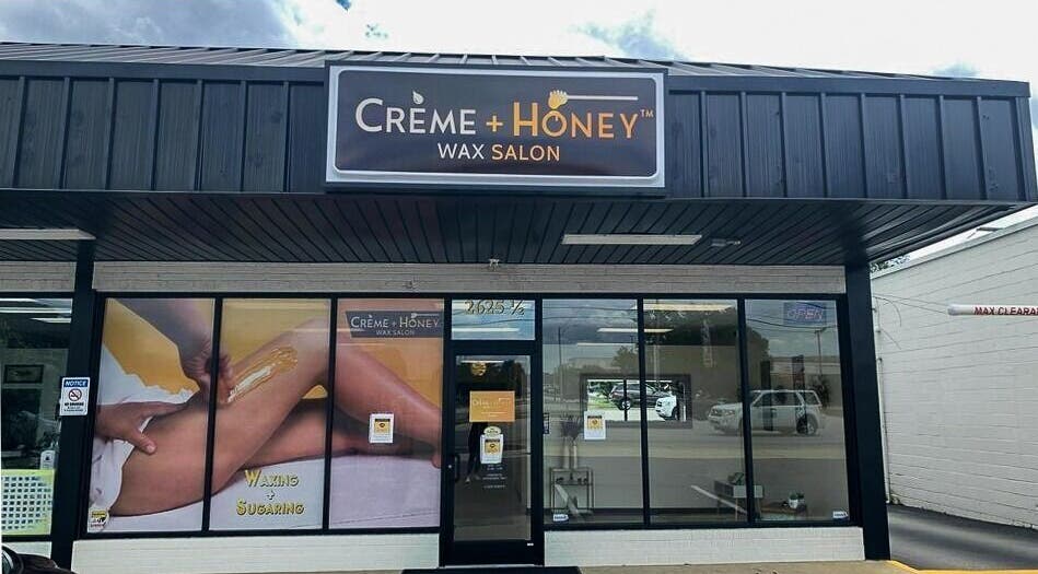Exterior view of Creme + Honey Wax Salon in Fayetteville, North Carolina, US featuring storefront window.