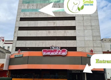 Tijuana Dentist Smile Dental Clinic entrance in Tijuana, Baja California, MX, showcasing building front.