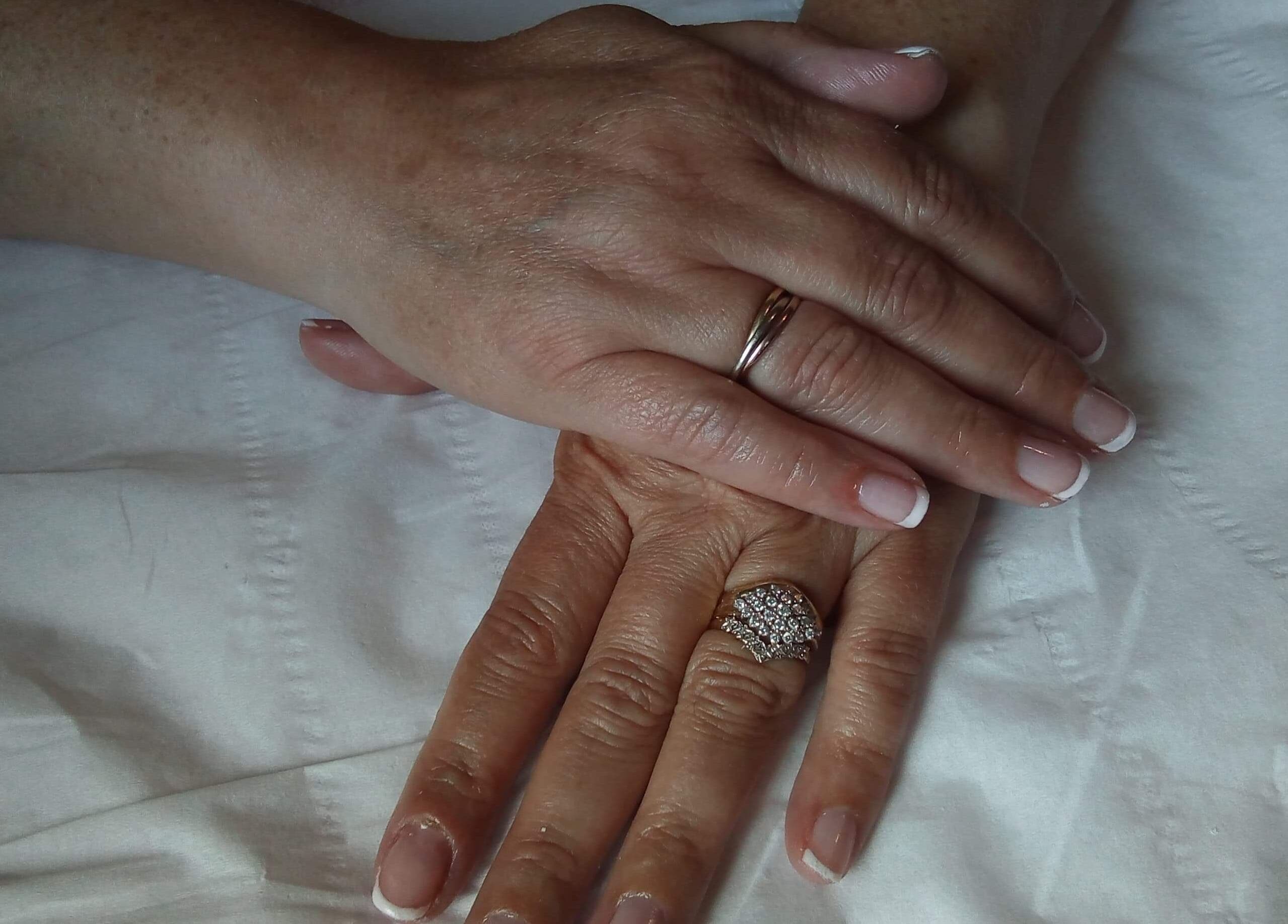 Manicured hands with rings at Beauty and Beyond, Greenock, Scotland, GB.