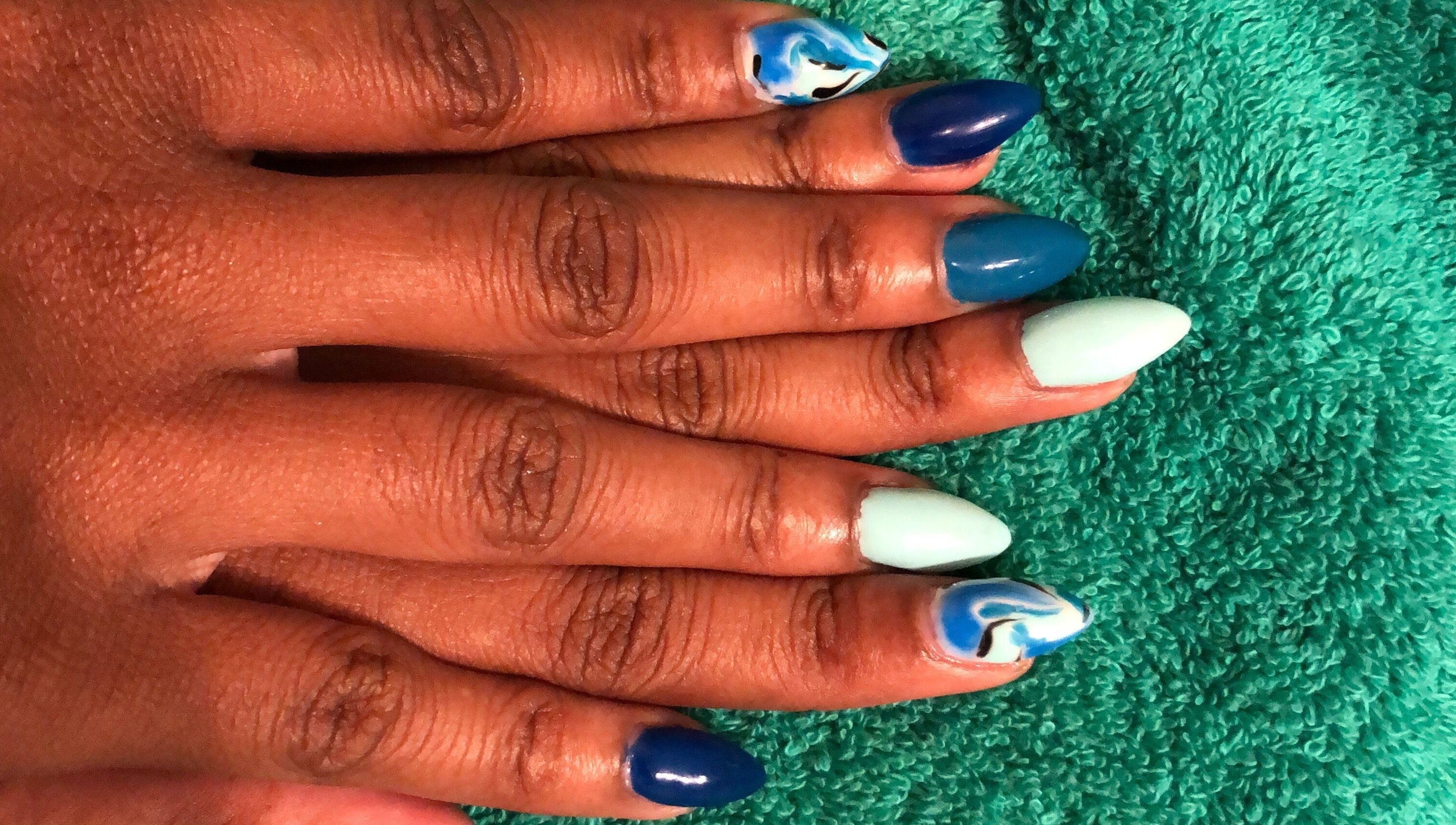 Artistic aqua nails at Essence Nail Bar, St.Philip, St.Philip, BB, showcasing creativity and style.
