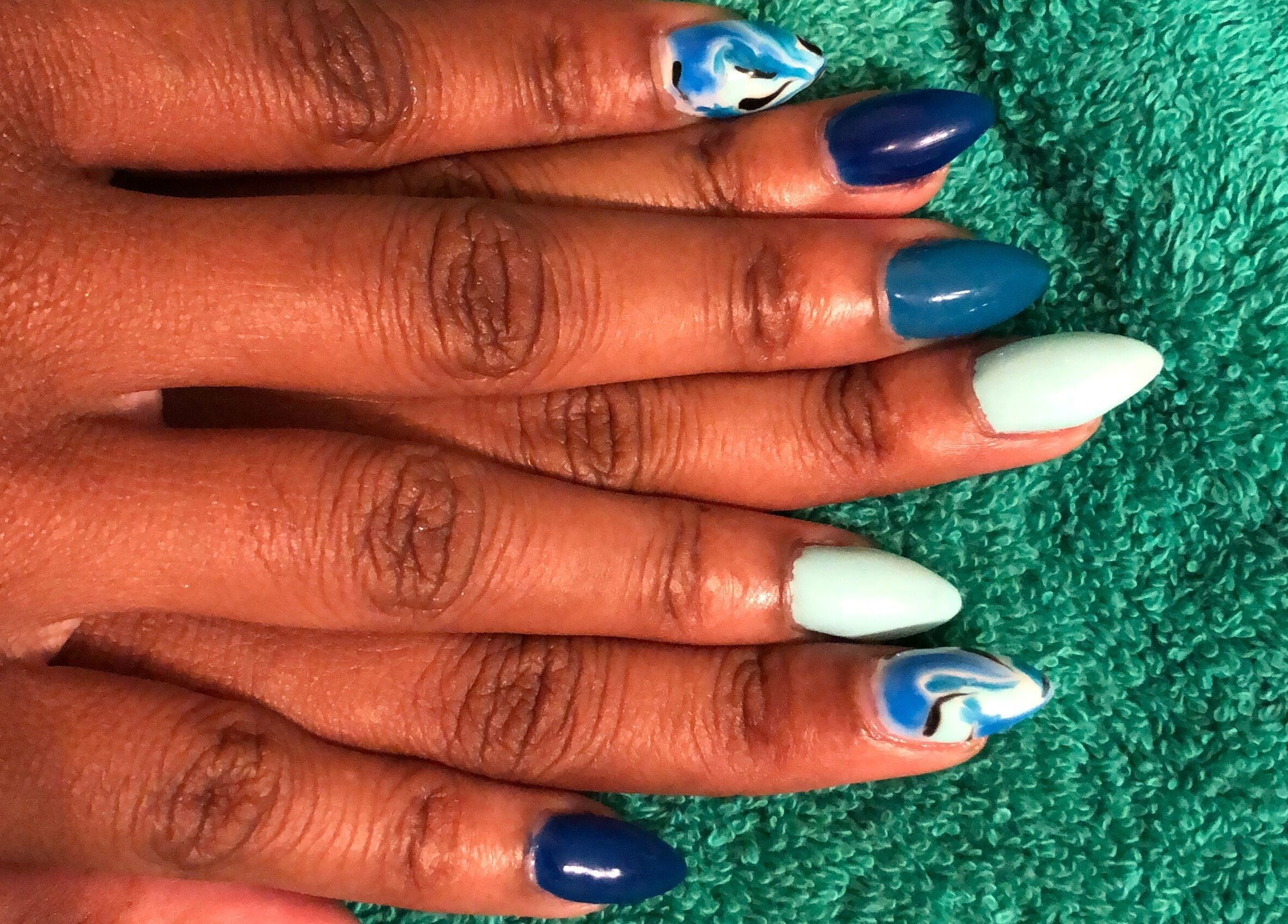 Artistic aqua nails at Essence Nail Bar, St.Philip, St.Philip, BB, showcasing creativity and style.
