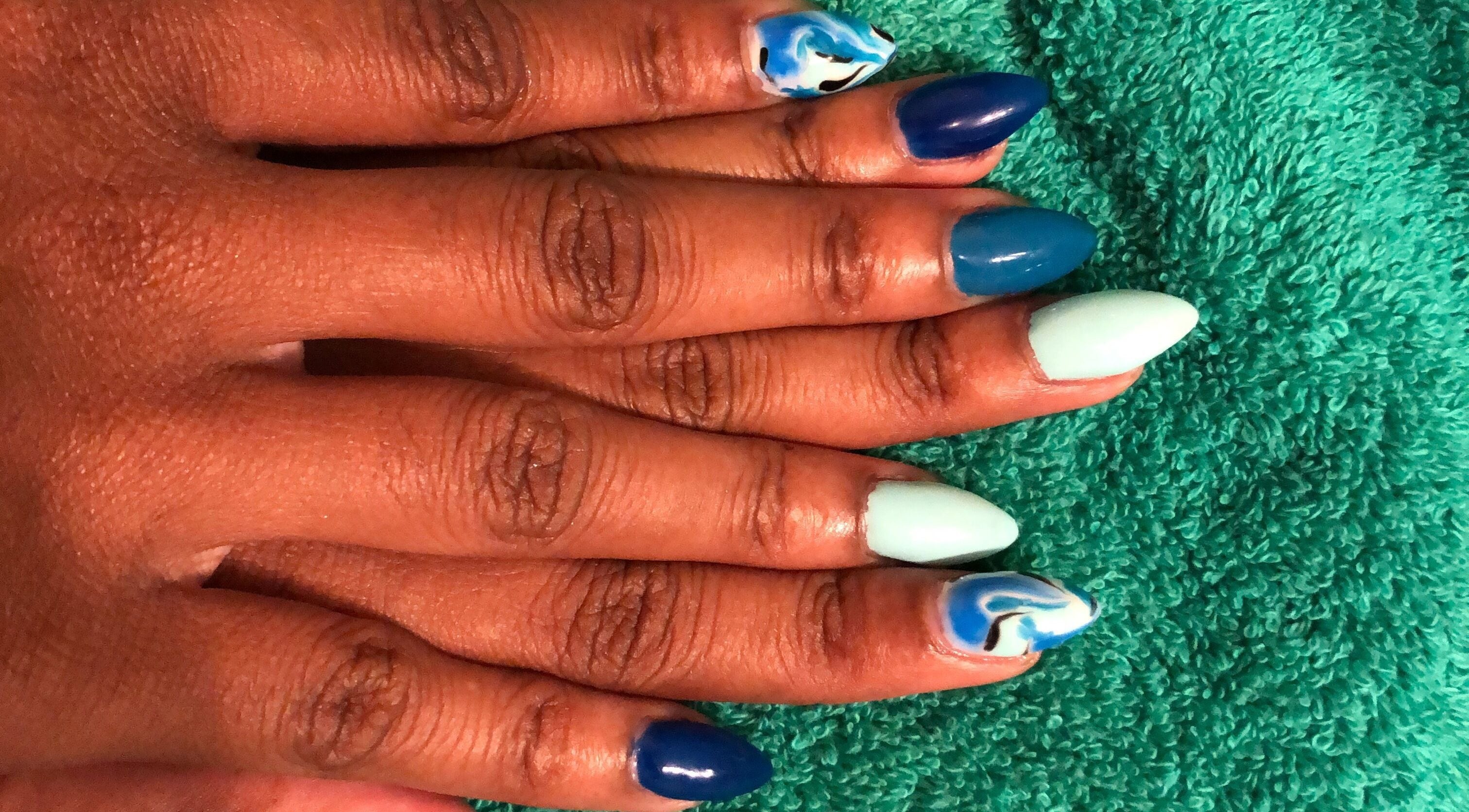 Artistic aqua nails at Essence Nail Bar, St.Philip, St.Philip, BB, showcasing creativity and style.