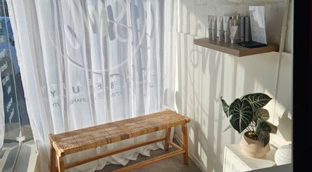 Cozy corner at SM Skin and Beauty, Strathmore, Victoria, AU with a bench and skincare products.