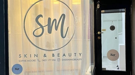 Entrance of SM Skin and Beauty in Strathmore, Victoria, AU showcasing a sleek design.