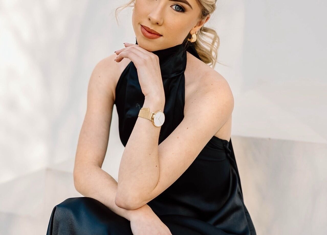 Sophisticated client at Skoonveldt, Klerksdorp, North West, ZA, showcasing elegant watch and attire.